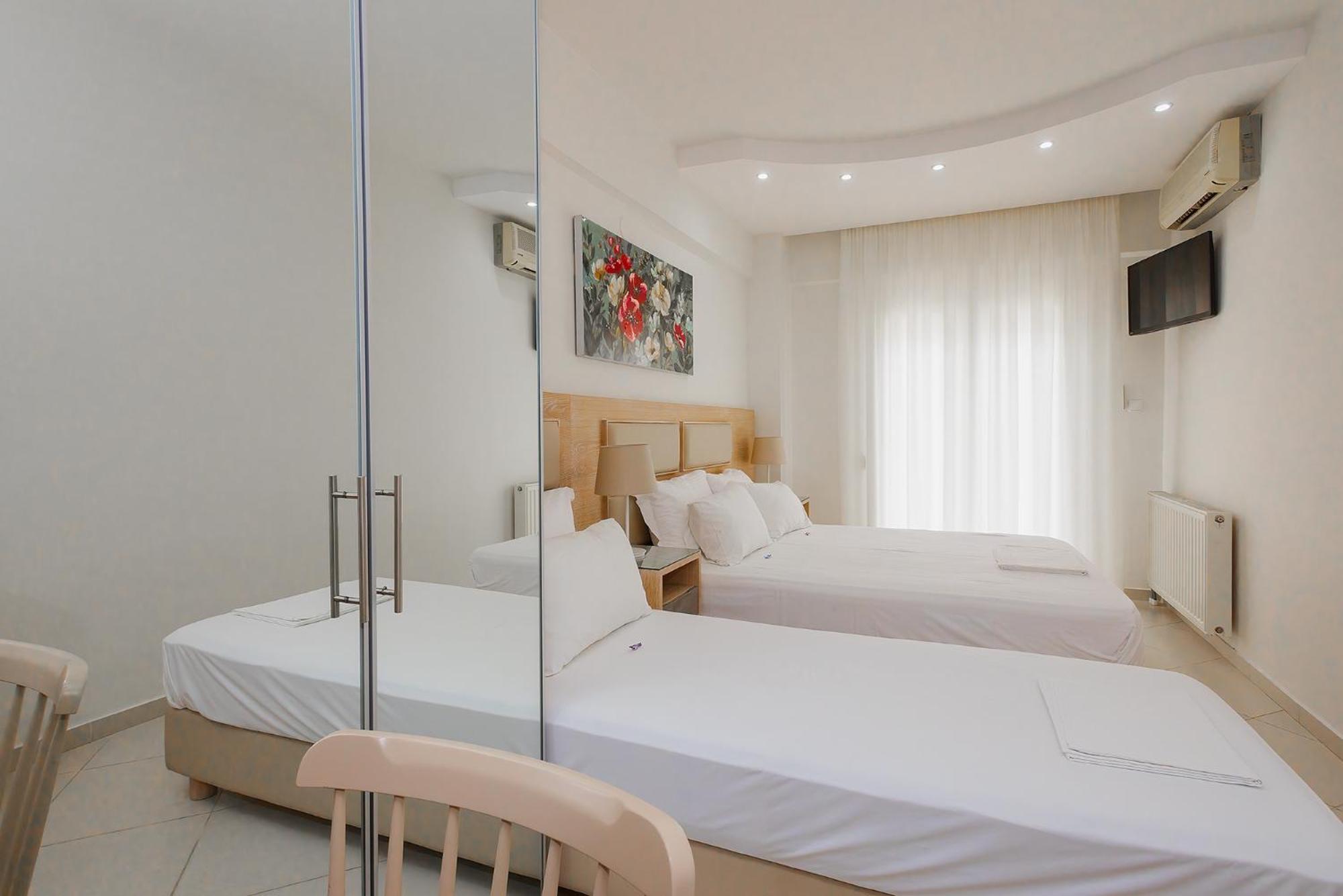 Le Monde Seaview Suites Nea Kallikrateia Екстер'єр фото